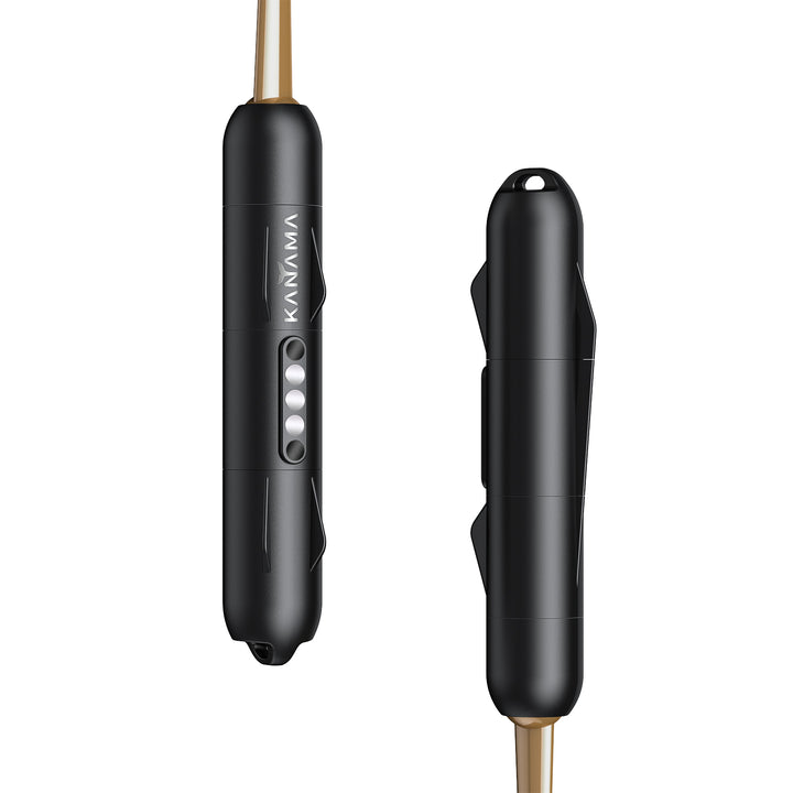 Two Kanama lures, featuring a sleek black metallic body with a gold-colored, tapered tip on one model and an all-black design on the other.