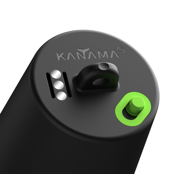 A fishing light from the Kanama brand. The key features include a circular, dark-colored housing that prominently displays the Kanama logo. The device has various controls, including a large gree