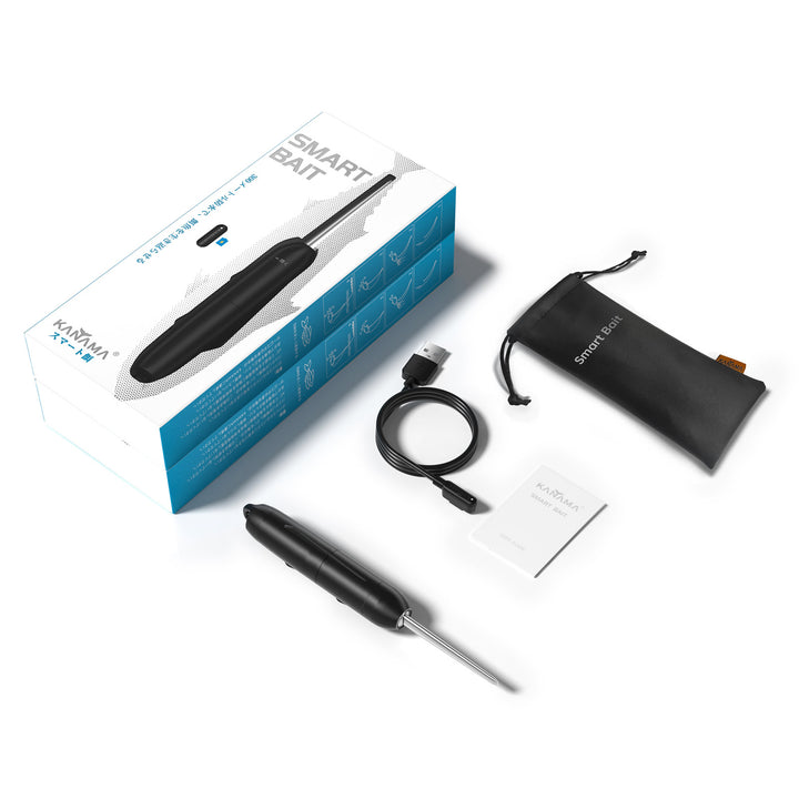 The image shows the contents of a "Smart Bait" package from the brand "KANAMA." The items include a black fishing bait device with a pointed end, a USB charging cable, a black pouch labeled "smart bait," and a user manual or card. 